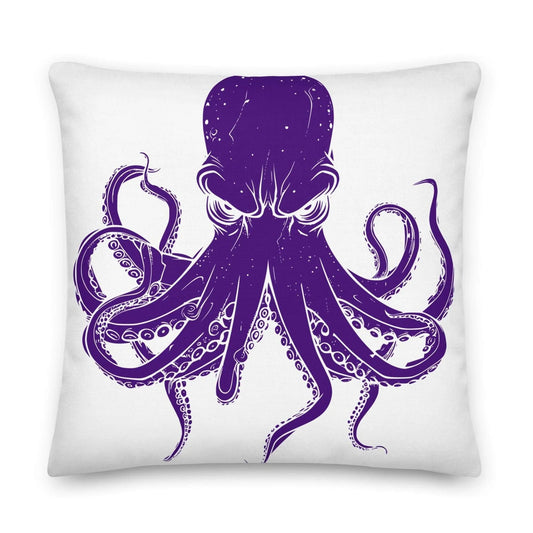 White pillow with a purple octopus design.